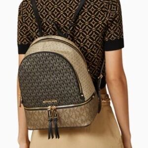 Medium Rhea Zippered Backpack in Signature Monogram Canvas